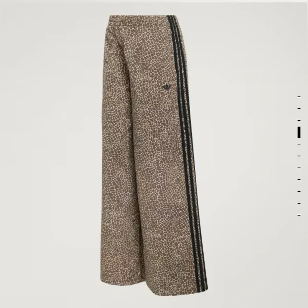 adidas Women’s FIREBIRD OVERSIZED AOP DENIM PANTS - Picture 1 of 7